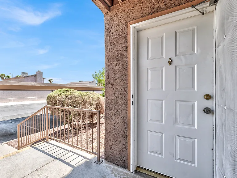 #GuardianRealty 2974 Juniper Hills #102 Las Vegas Condo Rental front door 2_08072025