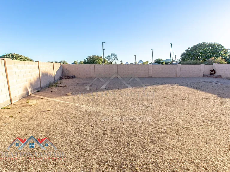 11751 W Daley Ln — Photo 43