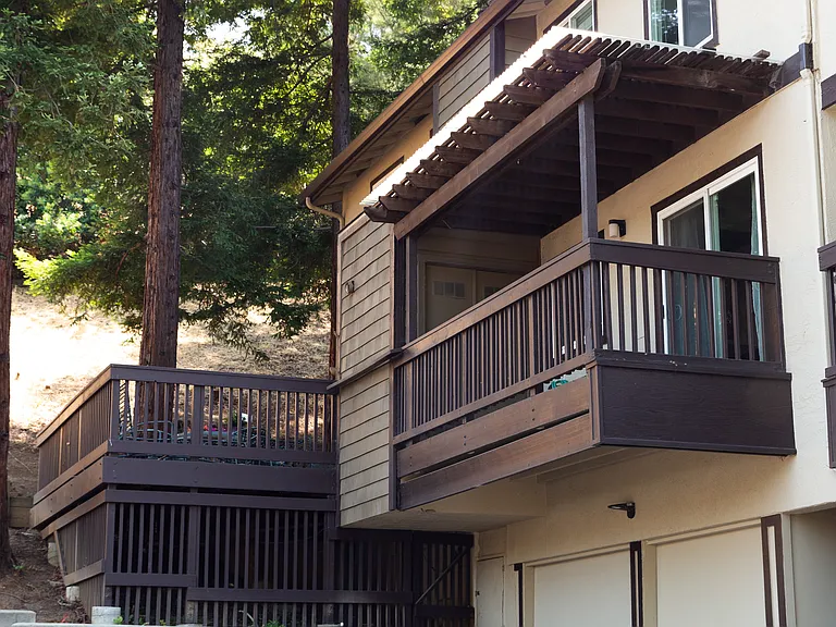 Patio deck off kitchen and dining area. Large Garage is below. Room for one car and for storage.