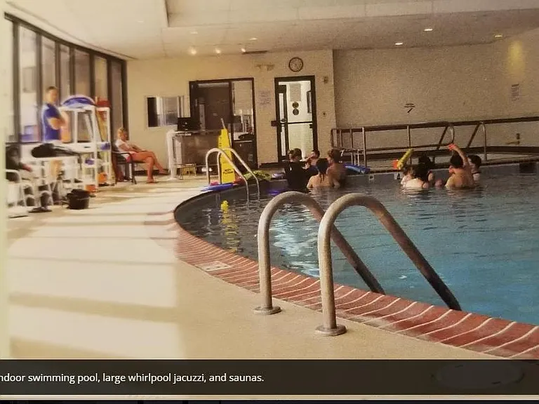 Heated indoor swimming pool with large whirlpool jacuzzi,
 and saunas
