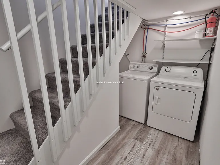 View of the stairs and laundry center