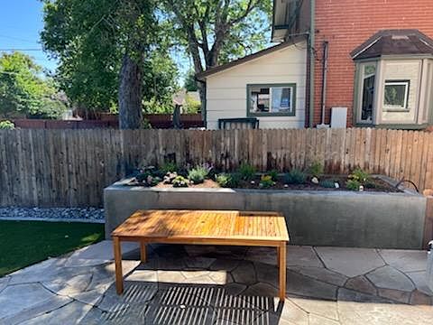 Built in 6 ft bench seat into planter bed.