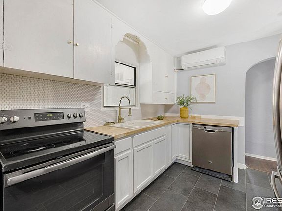 5th image of 4455 S Logan St