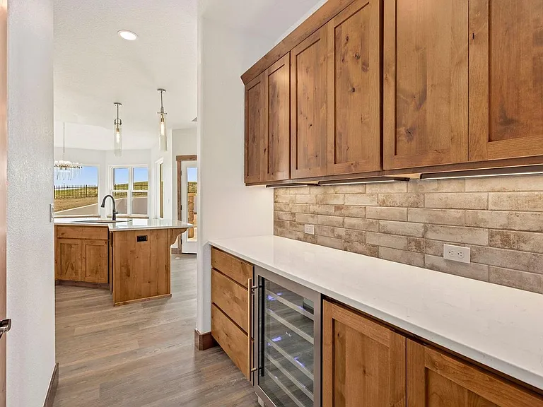 Butler pantry with wine refrigerator