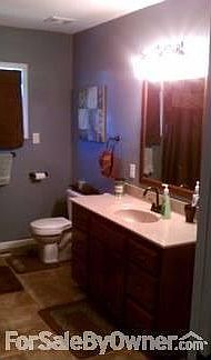 Master Bath
						:
						New master bath has tile, custom cabinets, jet tub Also has large pantry.