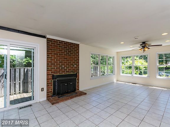Adjoining family room with fireplace