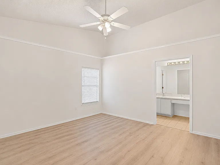 Master bedroom with vaulted ceilings