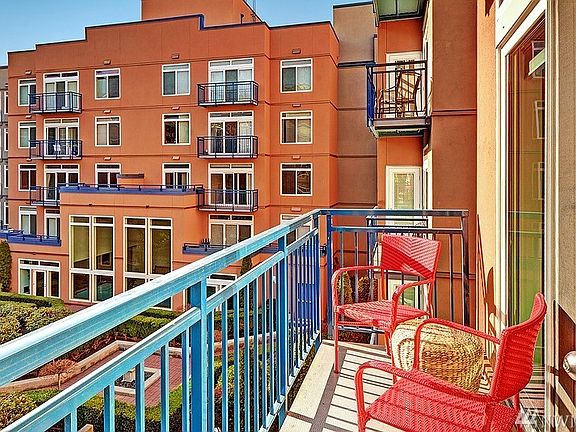 Stunning corner balcony unit overlooking the peaceful courtyard.