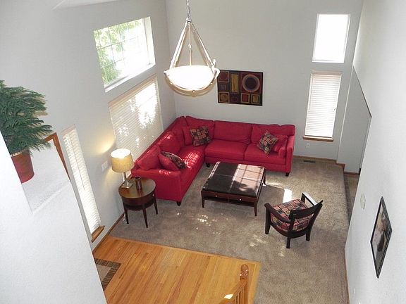 Notice the soaring ceilings in the living room.