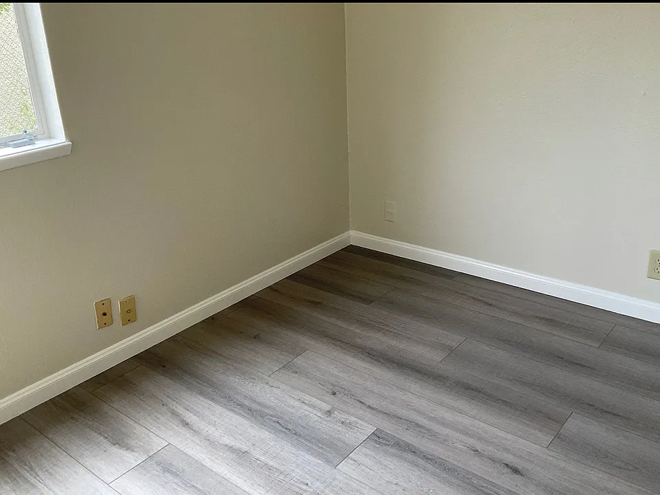 Unit #105 New Bedroom 1- View 1