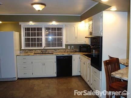 Kitchen
						:
						Italian Granite Counter tops, and 18" tile. Lot's of storage!