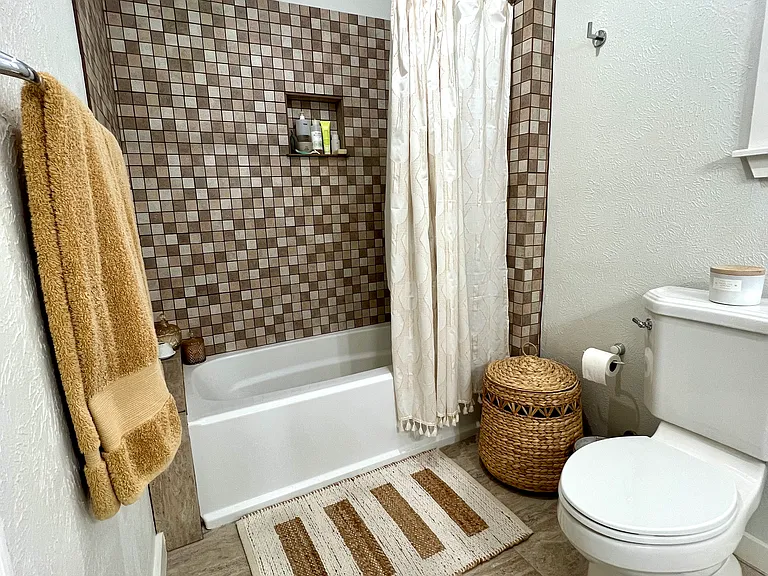 Large, elegant and private, upstairs master bathroom with large, soaking bathtub!