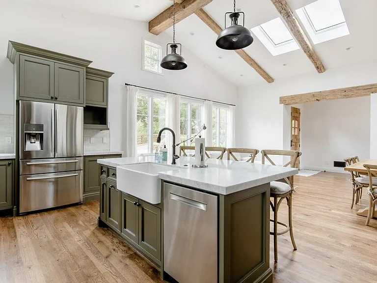 4 large skylights and large windows surround the living space