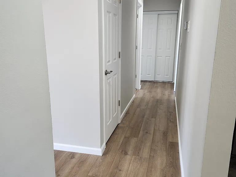 Coat Closet & Linen Closets in Hallway