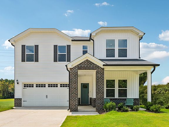 Taylorsville front exterior at a Meritage Homes community in Mebane, NC.