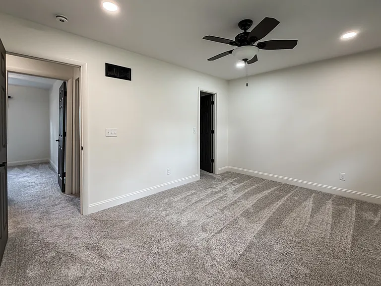 Primary Bedroom with 3/4 Bath and Walk In Closet