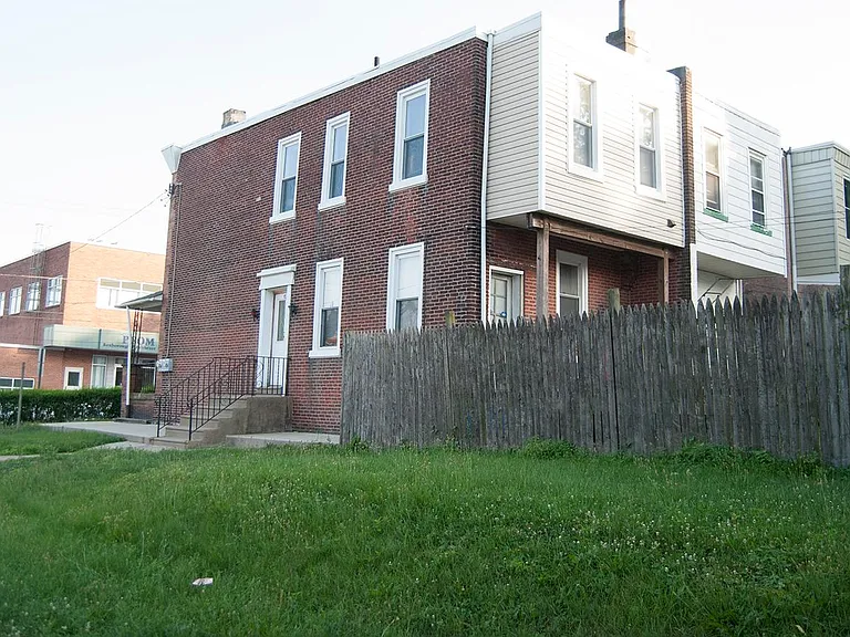 Side yard. Tenant is welcome to garden if interested.