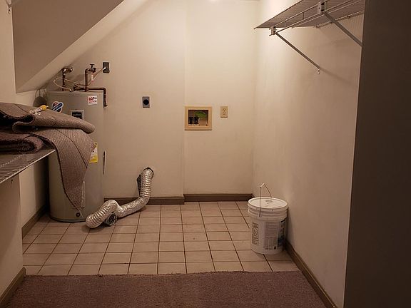Master bedroom walk-in closet with washer/dryer hookups