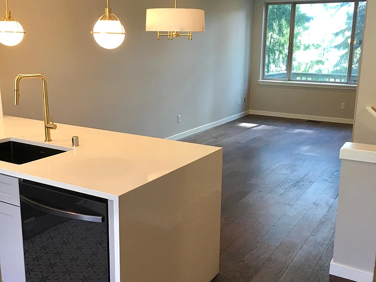 open floor plan: living room with large south facing window and balcony. Good size dining area.