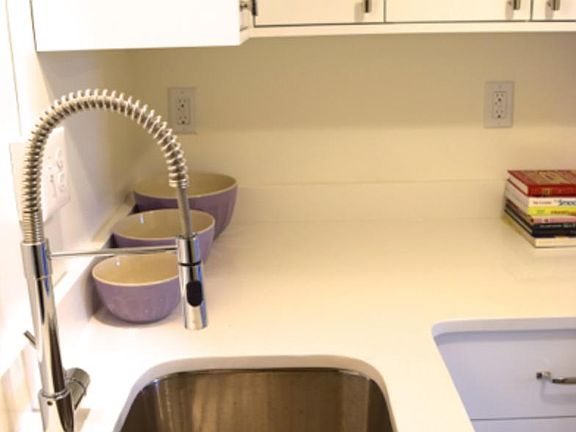 Quartz Countertops, deep stainless steel kitchen sink