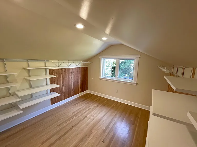 Giant cedar-lined walk in closet in primary suite