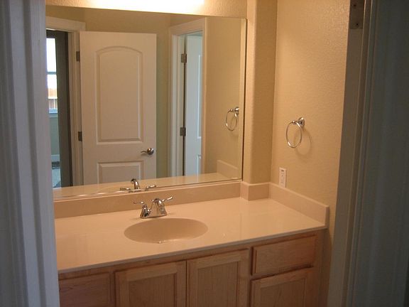 Bathroom Vanity w/ custom oak cabinetry.