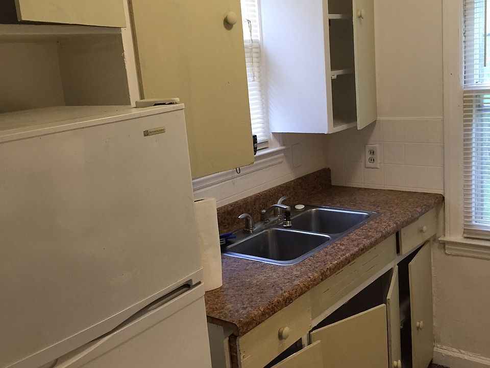 Kitchen with refrigerator