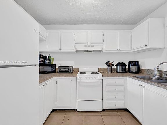 5th image of 9460 Live Oak Pl APT 407