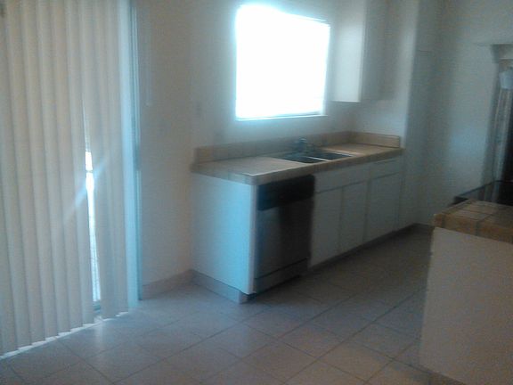 Kitchen with Frig, diish washer, Glass top Stove