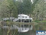 View of home across lake
