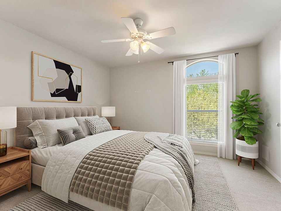 Bedroom. Furnishings are staged.