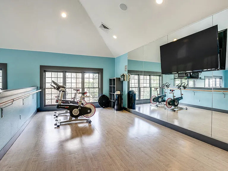 Peloton bikes in the upstairs studio of the fitness center