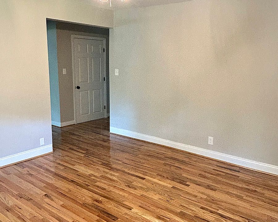Living Room:
New Windows and Entry Doors Throughout, Refinished Hardwood