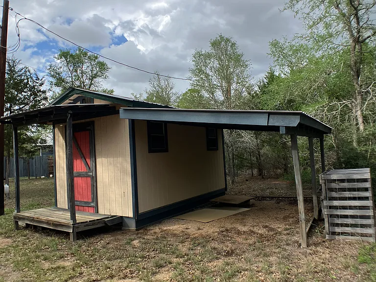 Outbuilding with Carport
