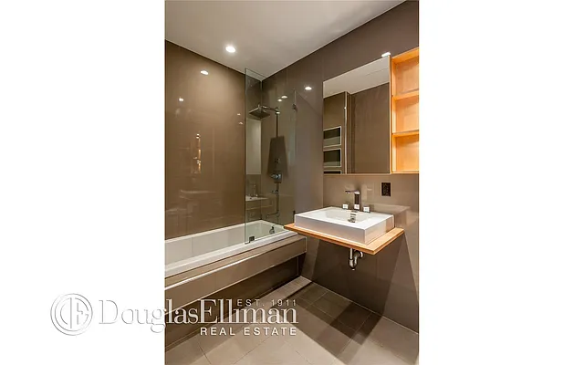 Sold by Douglas Elliman | media 13