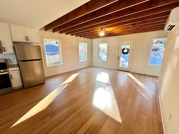 Hardwood floors with plenty of natural light and charm