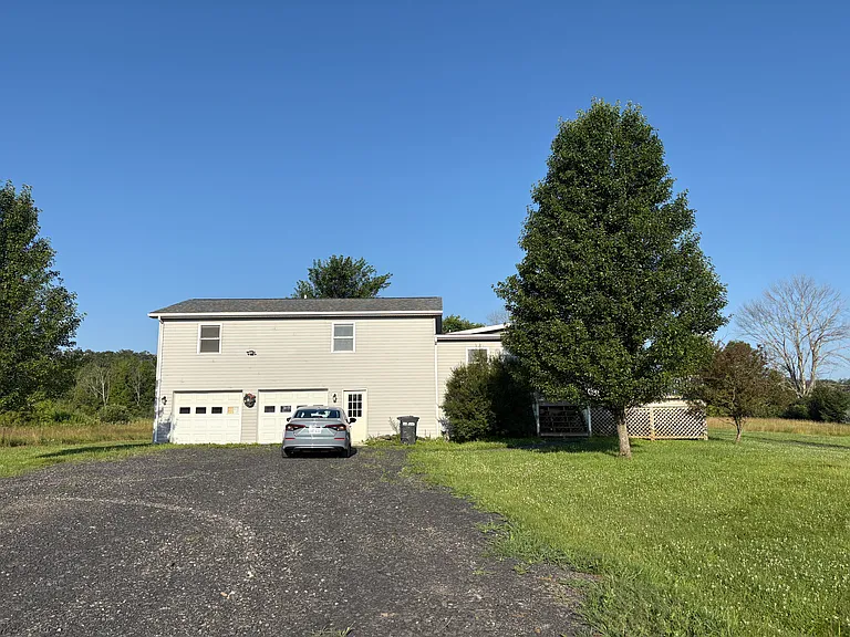 Private driveway with 2 car garage and separate entrance