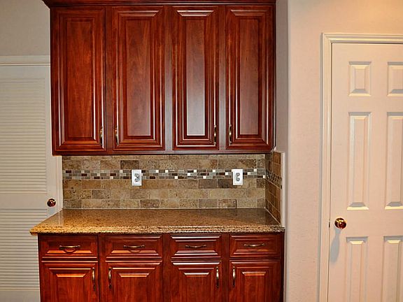 Kitchen has been totally updated.New custom cabinest,new counter tops, custom backsplash with glass inserts.
