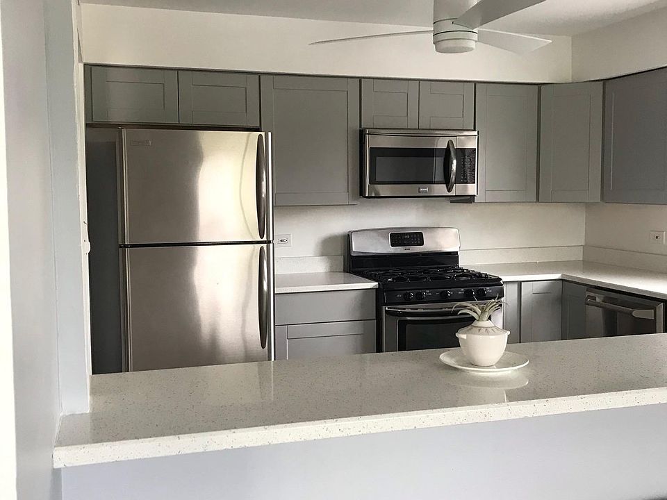 Completely renovated kitchen with Quartz countertops and brand new kitchen cabinets
