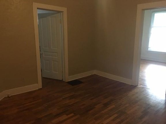 Living room into both entry doors to the bedrooms