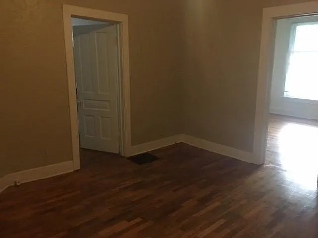 Living room into both entry doors to the bedrooms