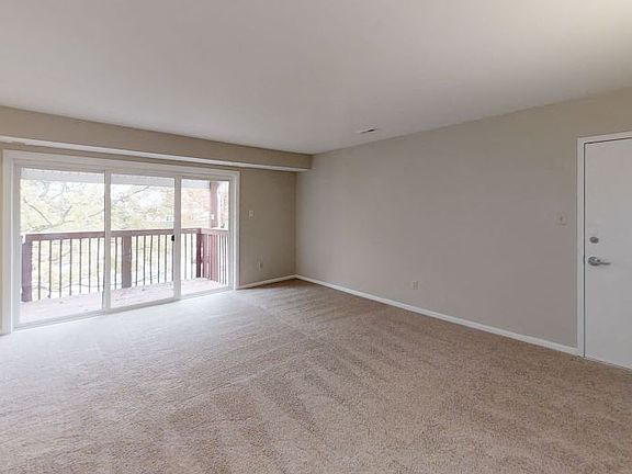 Balcony & Wooded Views Available