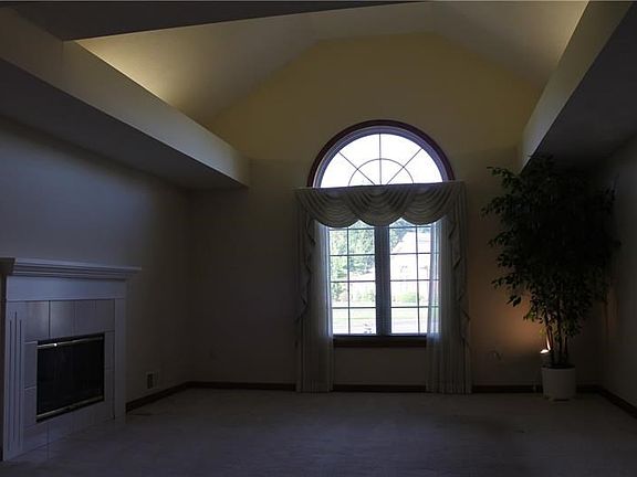 Living room with large window to let in morning light