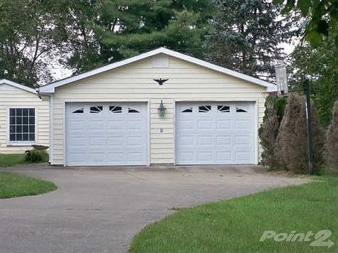 2 car detached garage with concrete floor