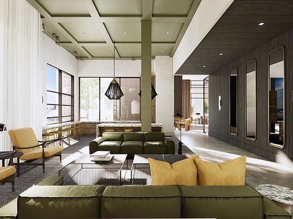 Expansive clubroom with gathering space and comfortable seating.