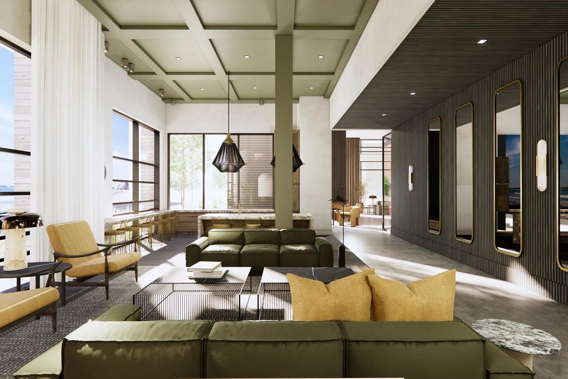 Expansive clubroom with gathering space and comfortable seating.