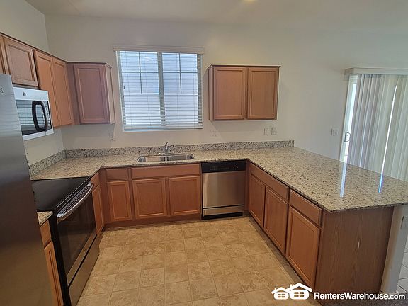 5th image of 2416 N 73rd Ln
