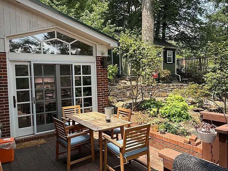 Private garden and deck for relaxation and entertaining.