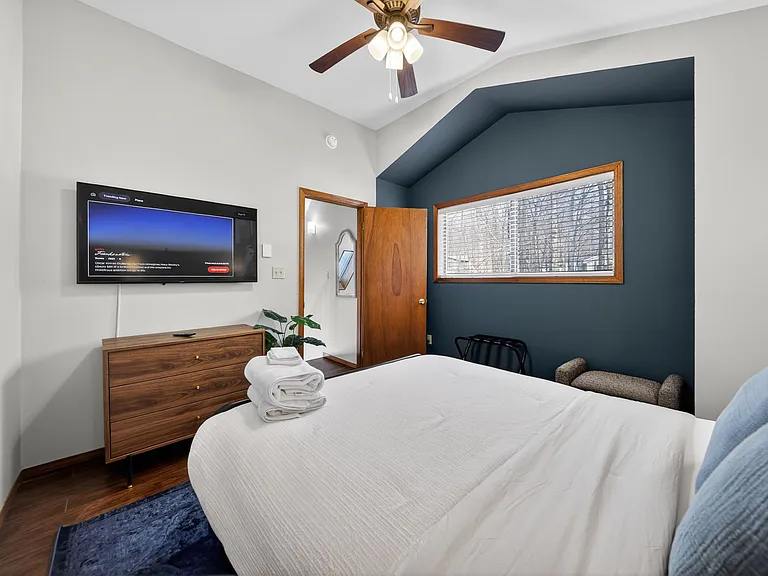 Fully Furnished Primary Bedroom _ Featuring a comfortable bed, ample storage, and a welcoming atmosphere for rest and relaxation.