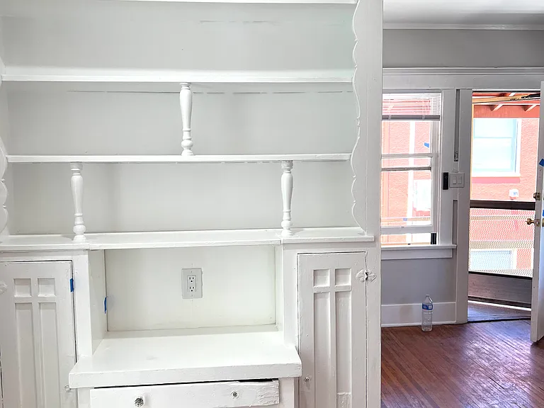 vintage bookcase in LR